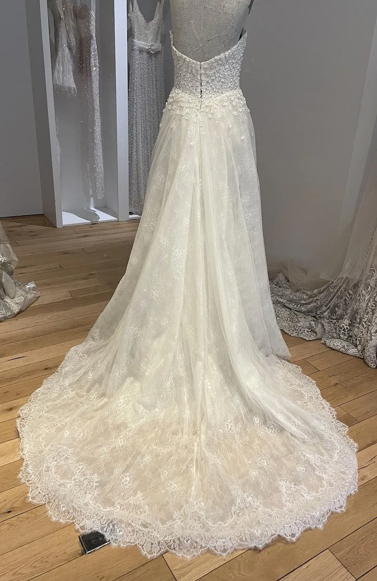 C2023-SBB4 - strapless fitted wedding gown with flowing over skirt