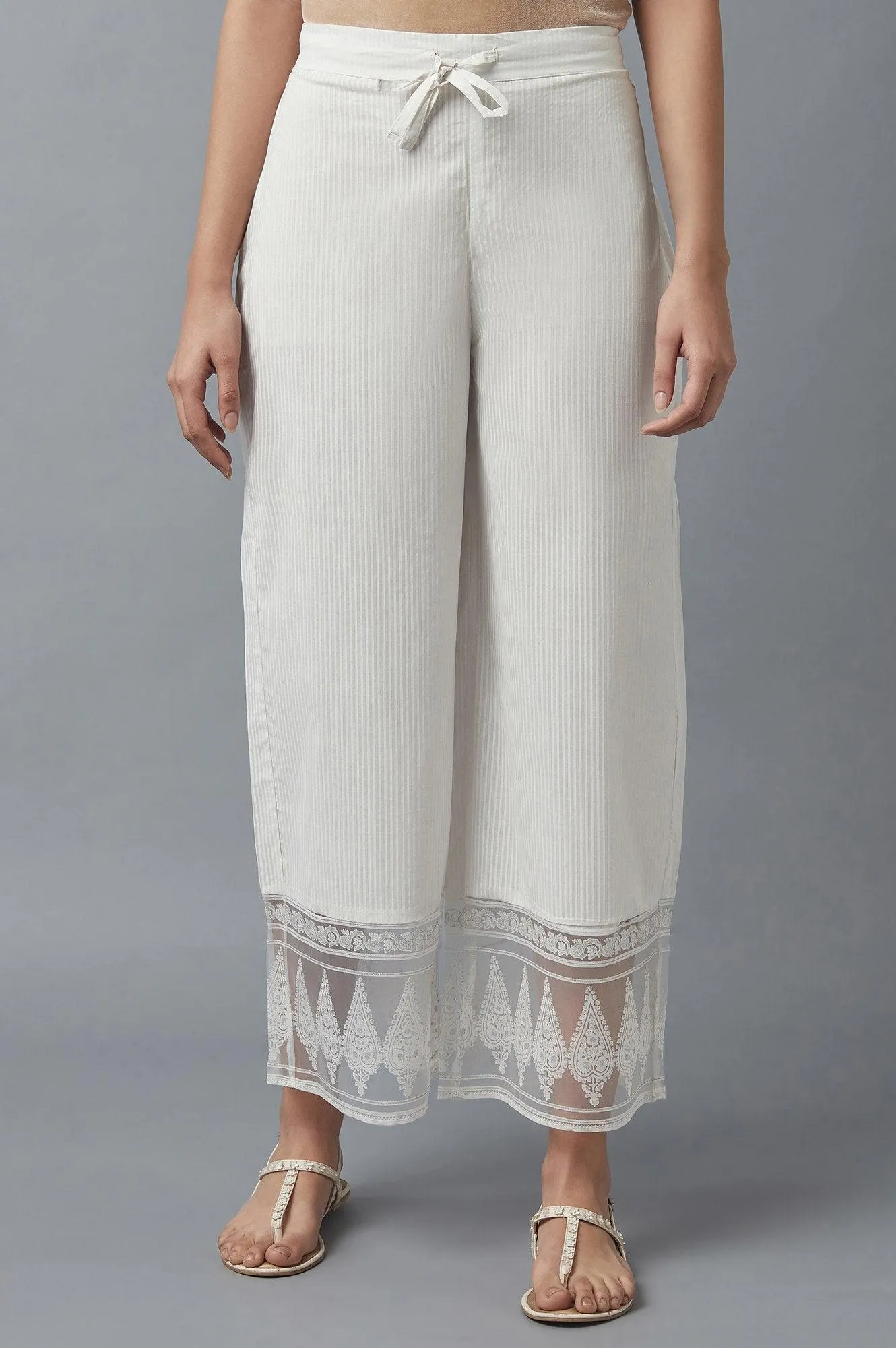 Ecru Parallel Pants with Floral Motifs