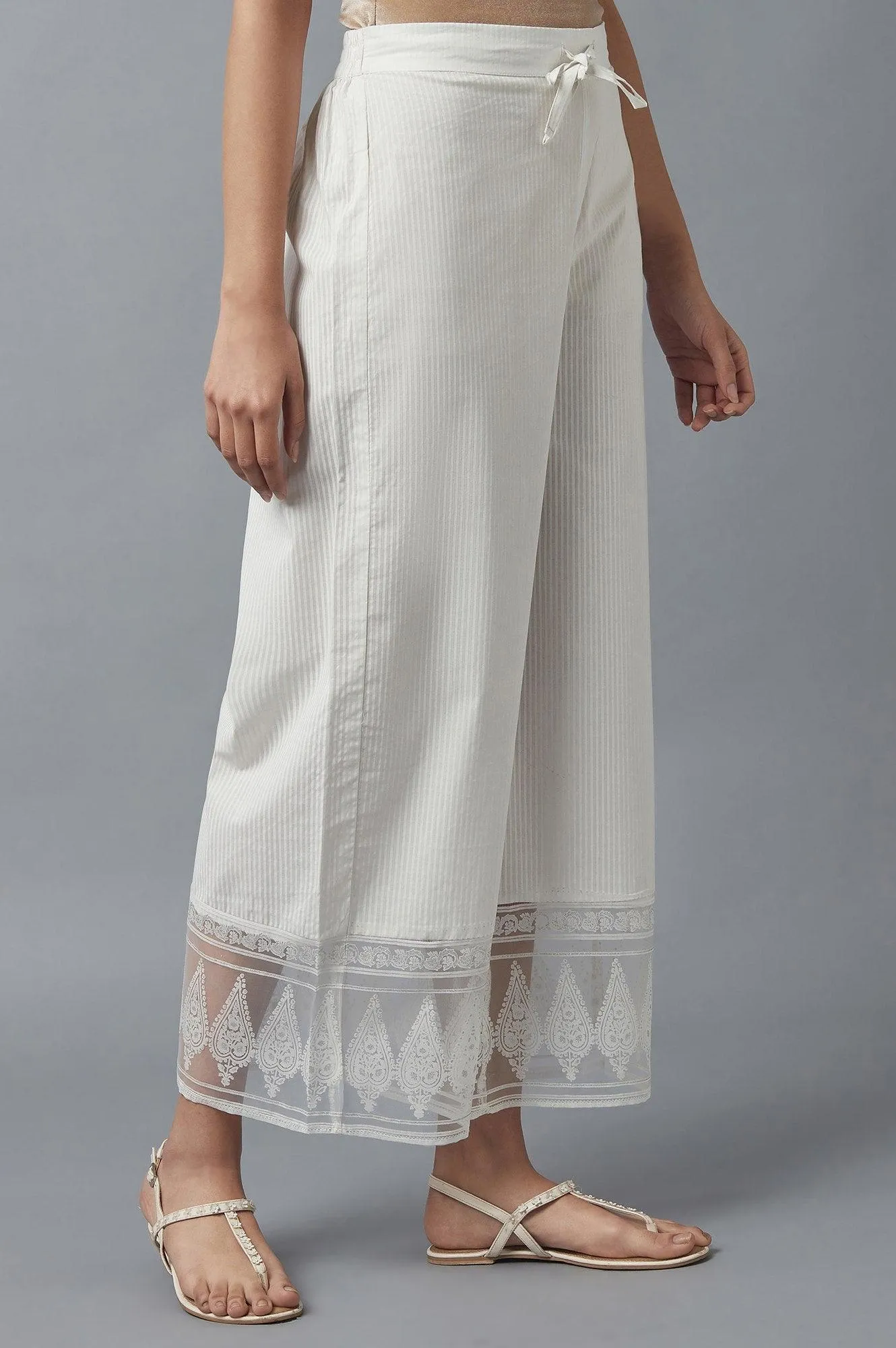 Ecru Parallel Pants with Floral Motifs