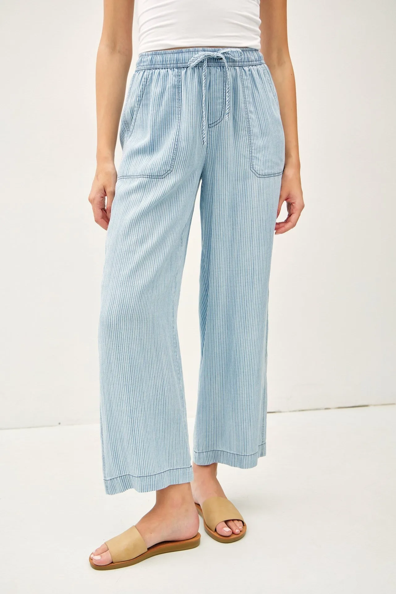 TIDAL LINES STRIPED PANTS